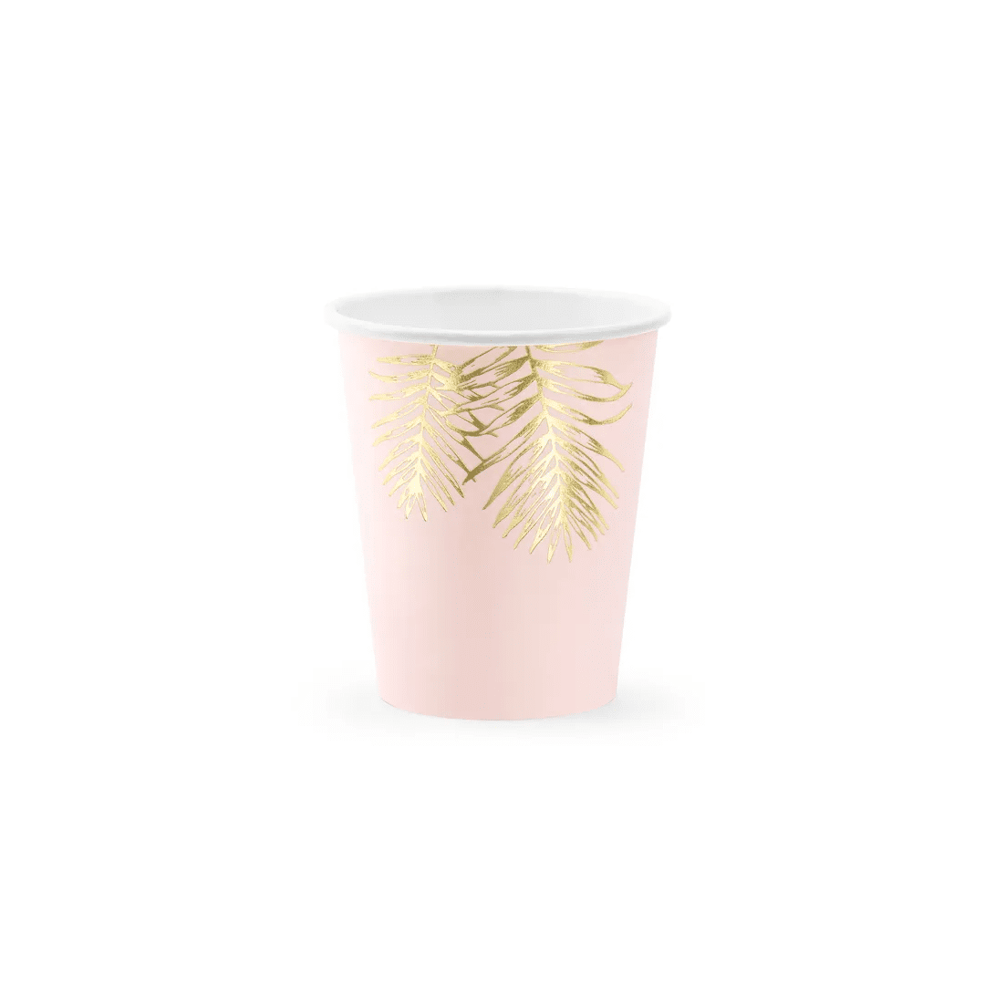 xícaras rosa com folhagem dourada