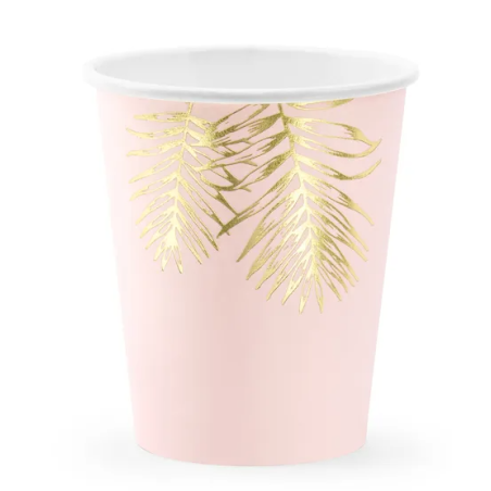 xícaras rosa com folhagem dourada