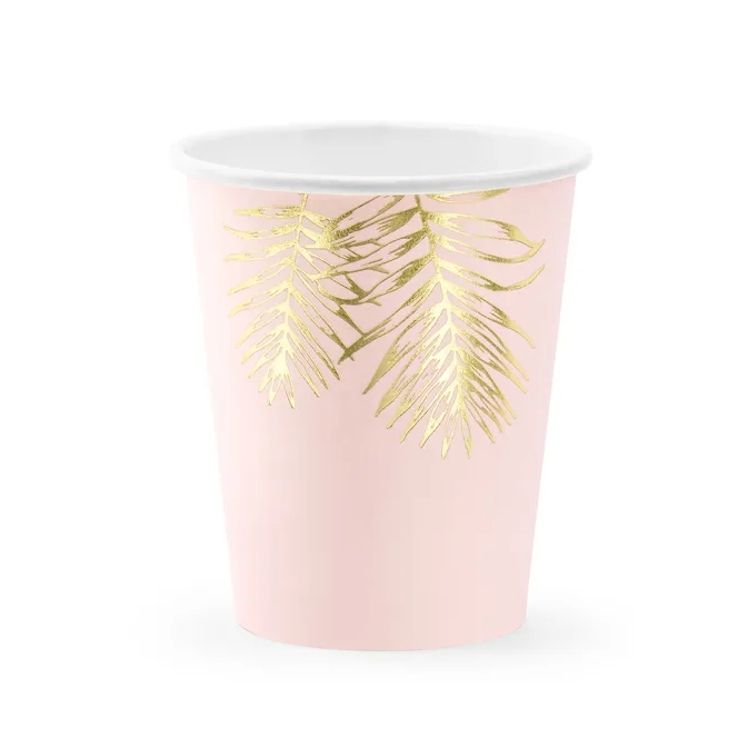 xícaras rosa com folhagem dourada