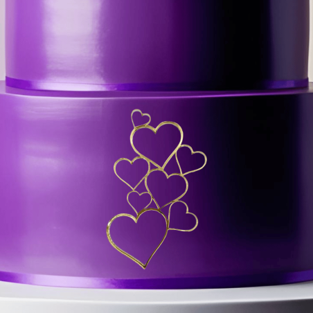 topo de bolo roxo com formato de coração e espelho dourado