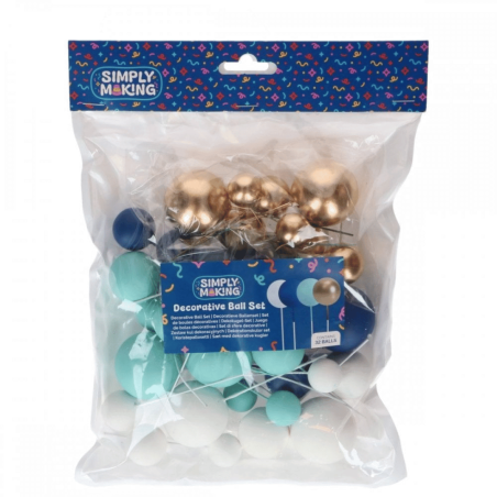 Conjunto de 32 enfeites para decorar um bolo de chá de bebê.