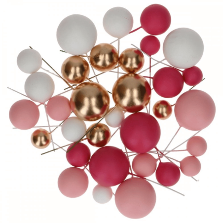 Bolas decorativas para bolos nas cores rosa, branca e dourada.