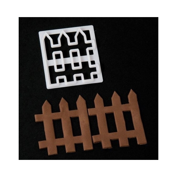 design de bolo com barreira cortadora de biscoitos